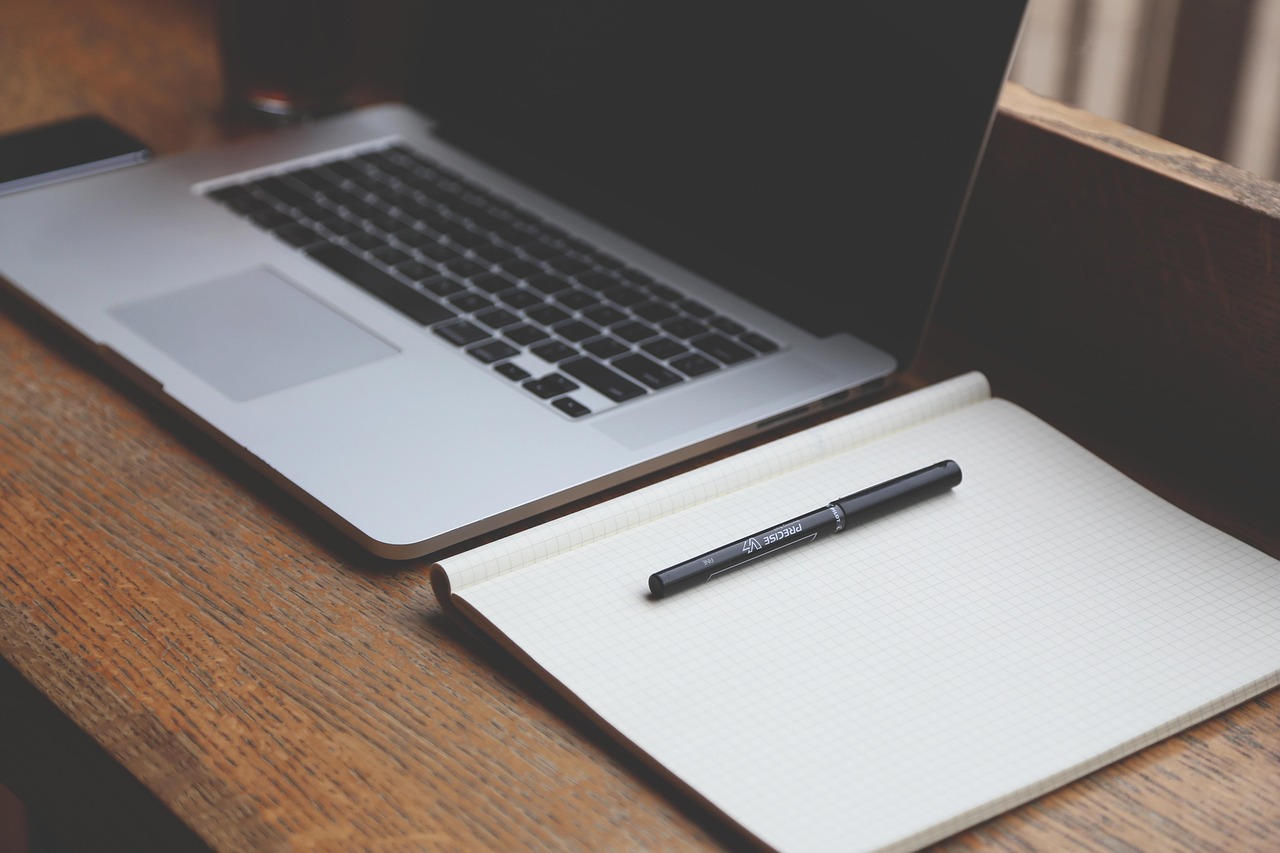 Remote worker at a laptop in a home office, the classic virtual assistant setup